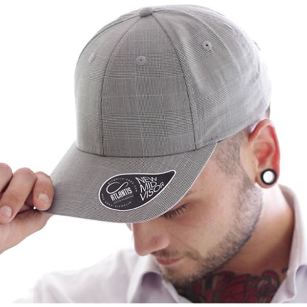 A grey cap with a checkered pattern and a logo on the brim. The cap features a flat visor and an adjustable fit.