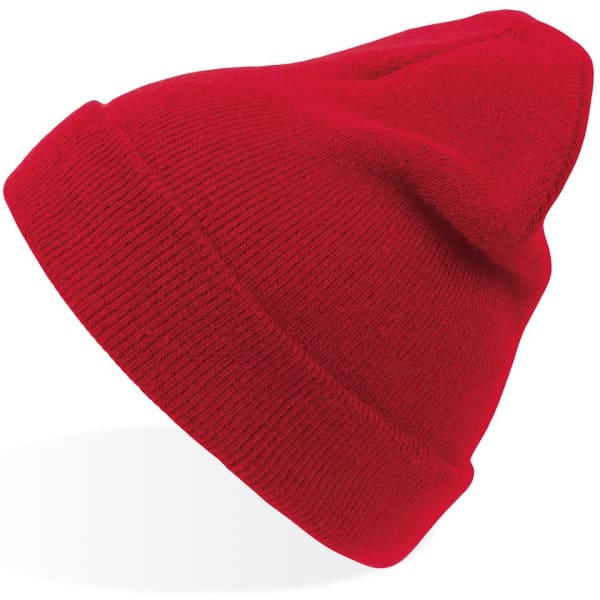 A red beanie with a folded cuff, featuring a simple design and a branding logo.