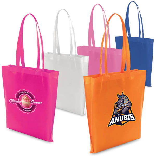 A collection of non-woven tote bags in pink, white, orange, and blue, featuring various logos and designs.