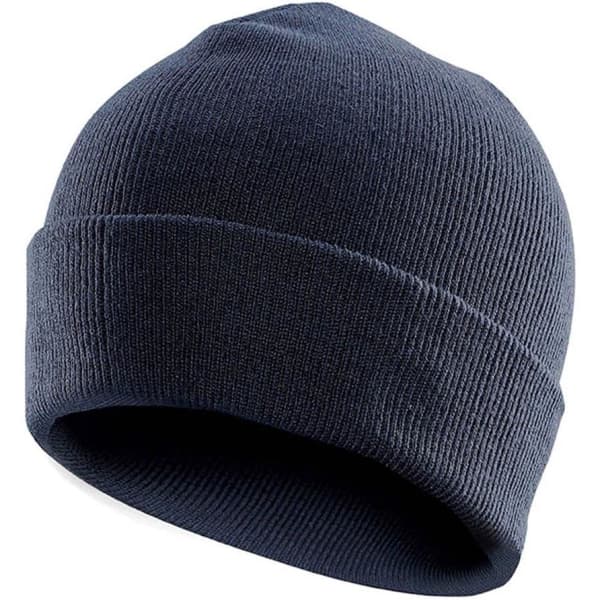 A navy beanie with a ribbed texture and a folded cuff, featuring a logo on one side.
