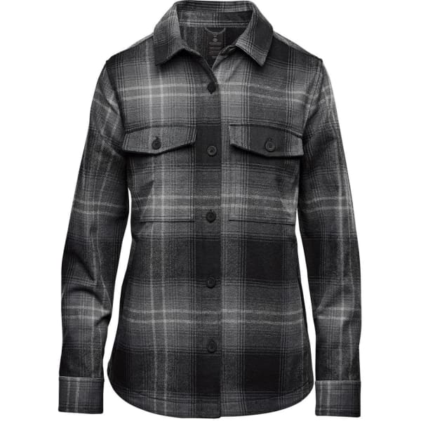 A women's shacket in a black and grey highland plaid pattern, featuring a button-up front and two chest pockets.