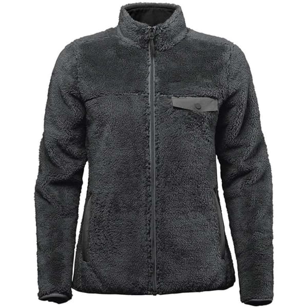 A women's polar fleece jacket in dark grey, featuring a front zip and a small chest pocket. It has a logo.