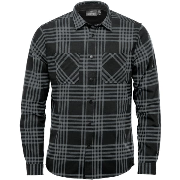A button-up men's shirt in black and grey plaid, featuring two front pockets and a collar. Includes a logo.