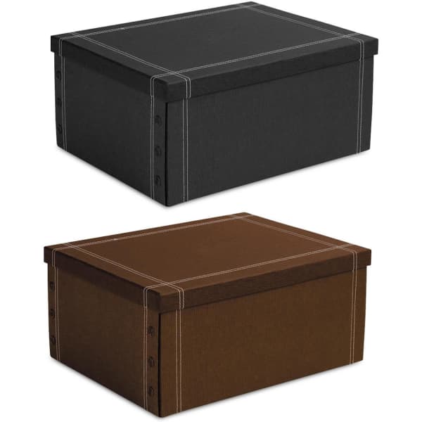 A large keepsake box available in black and brown, featuring stitch detailing and a smooth finish.