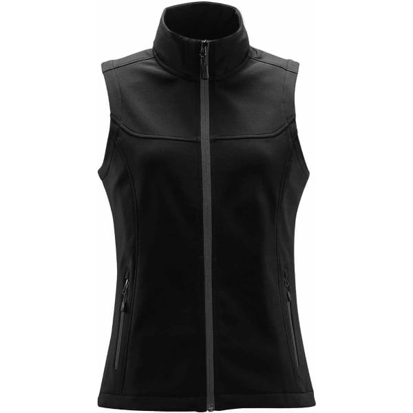 A black women's softshell vest featuring a high collar, zip front, and side pockets. It has a branded logo.