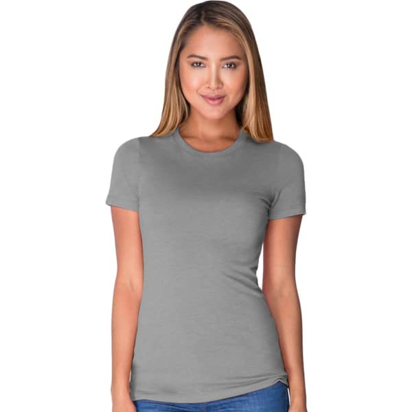 A woman is wearing a grey women's tri-blend crew t-shirt. The shirt features a fitted design and a slight stretch.