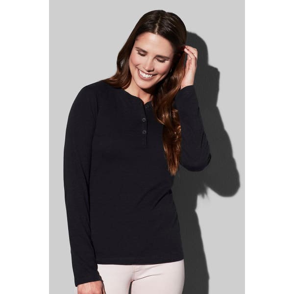 A long-sleeve black henley shirt for women, featuring a buttoned neckline and a relaxed fit.