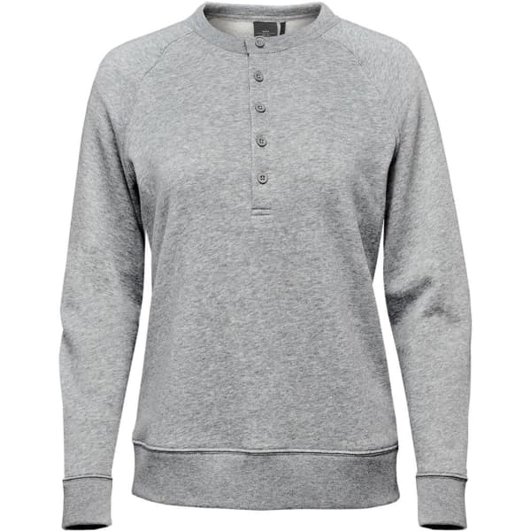 A women's grey Monashee Henley shirt featuring a button-up neck and long sleeves, with a logo on the label.