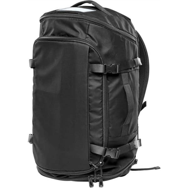 A black duffle bag with adjustable straps and multiple compartments, featuring a logo on the side.
