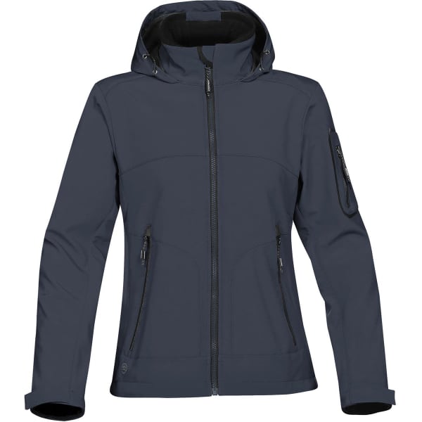 A dark blue women's softshell jacket featuring a zippered front, hood, and multiple pockets. It includes a logo on the sleeve.
