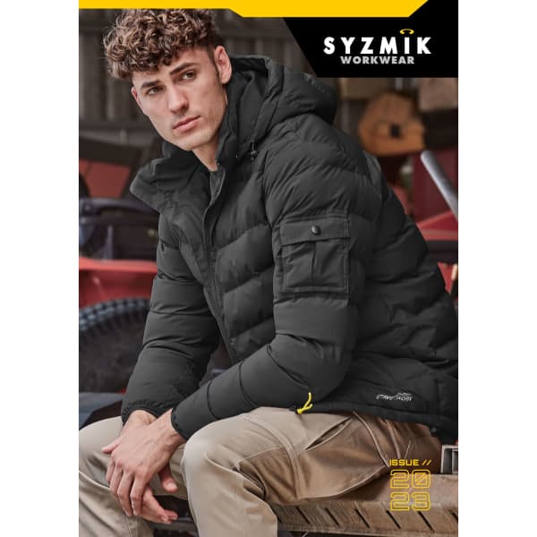 A black puffer jacket is worn by a seated model, showcasing a stylish and practical design. The image features a logo.