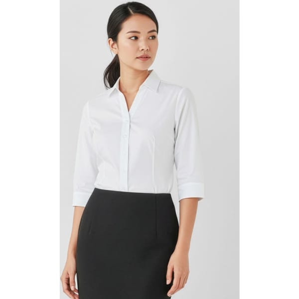 A white women's button-up shirt with 3/4 sleeves, featuring a collar and a logo on the side.