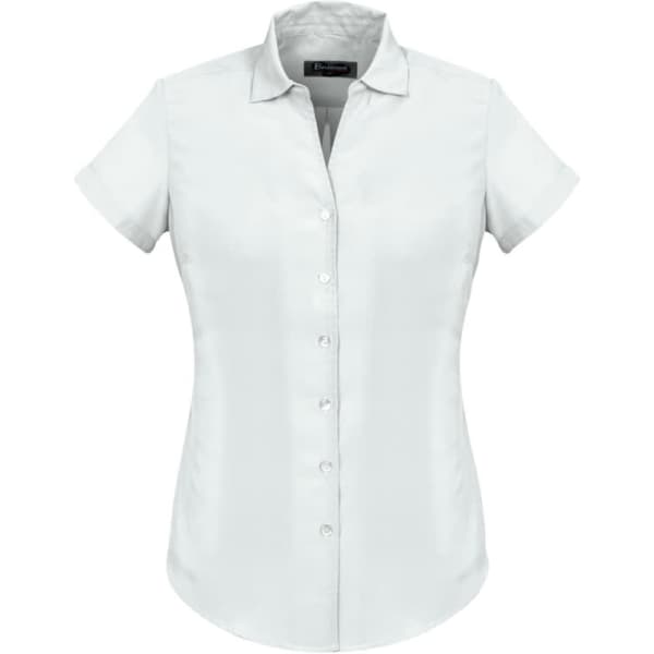 A plain short sleeve shirt in light blue, featuring a button-up front and a collar, with branding displayed.