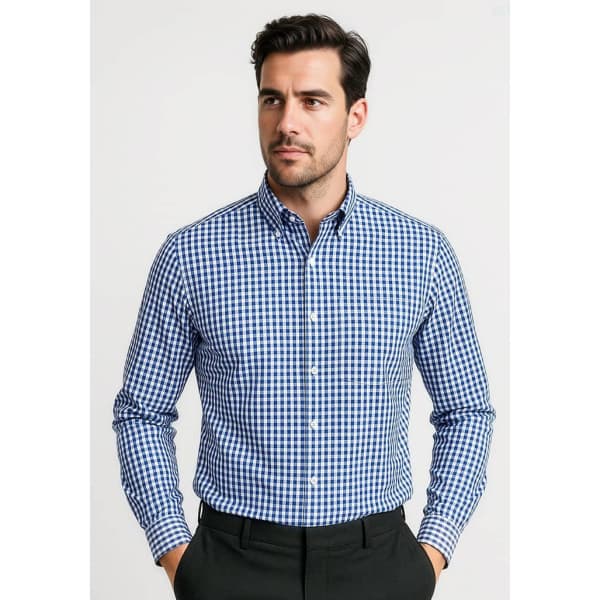 A blue and white checkered long sleeve button-up shirt featuring a collar, worn by a male model.