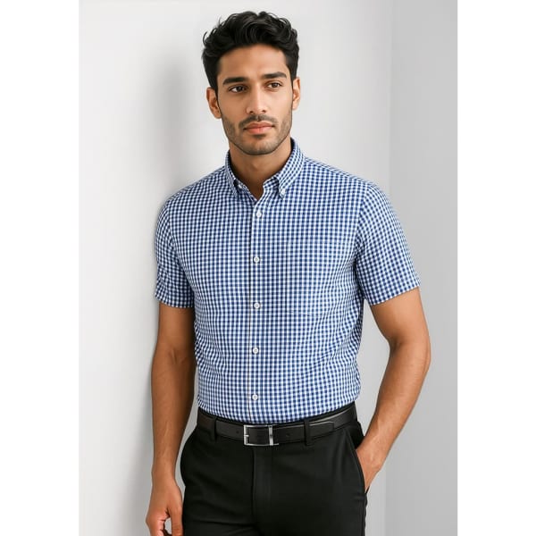 A short sleeve button-up shirt in a blue and white gingham pattern, featuring a collar and a logo.