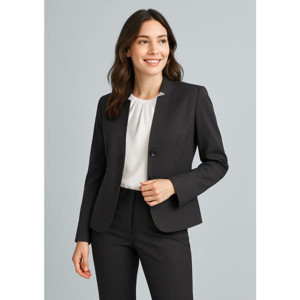 A black women's cool stretch short jacket with reverse lapel, styled with a white top and black trousers.