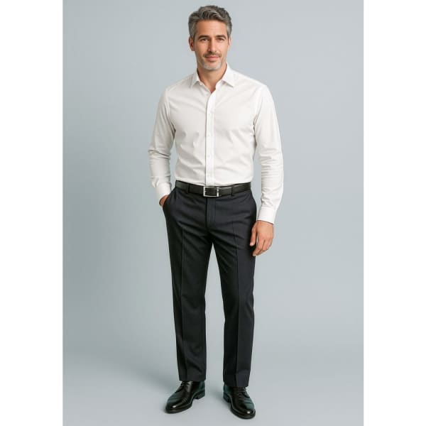 A man in a white shirt and black slacks stands confidently, showcasing the adjustable waist pant with a logo.