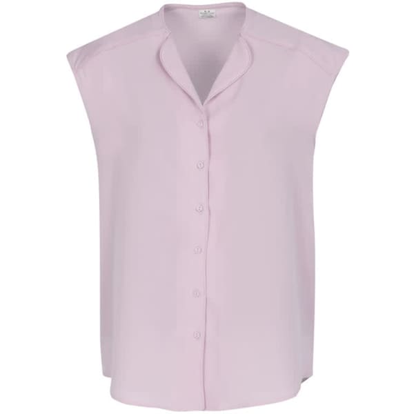 A light pink women's blouse with a collar and short sleeves, featuring a button-down front and a subtle logo.