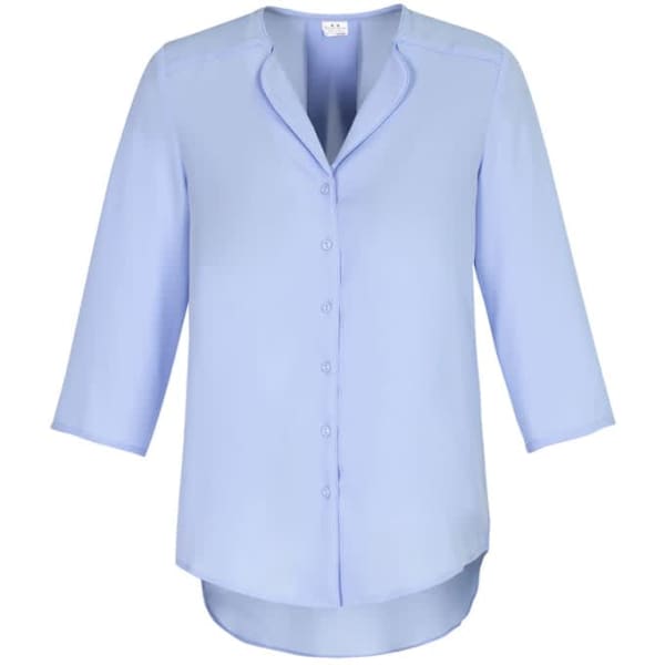 A light blue longline blouse featuring a button-up front and three-quarter sleeves. The blouse has a smooth, elegant design.