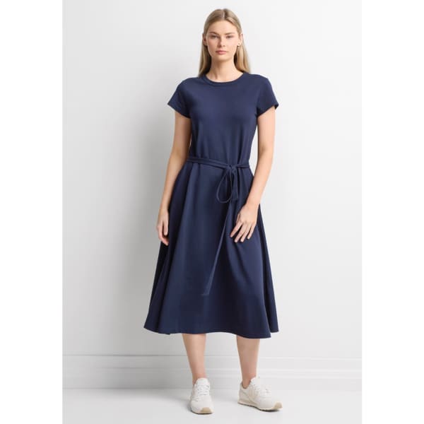 A navy midi dress featuring short sleeves and a tied waistband, styled elegantly on a model.