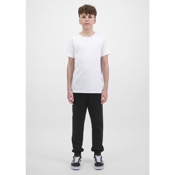 A pair of black track pants for youth, paired with a plain white t-shirt and black shoes.
