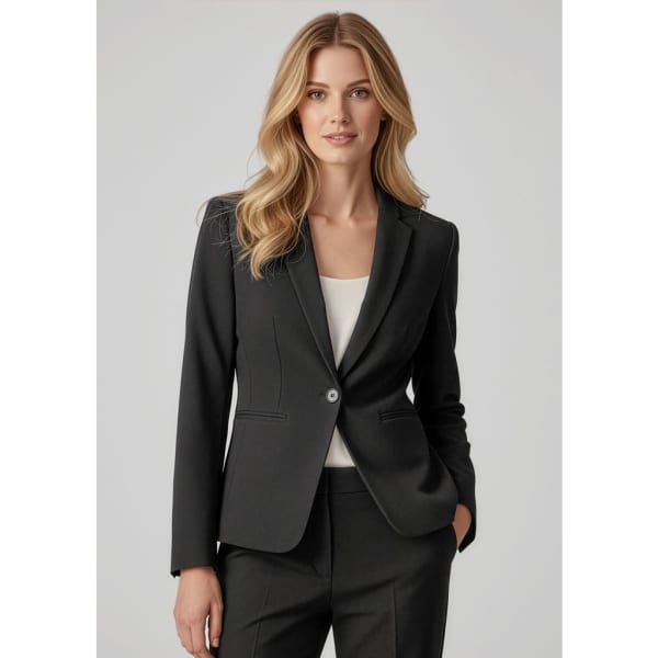 A fitted women's blazer in black, featuring a one-button closure and a tailored silhouette, with a model wearing it.