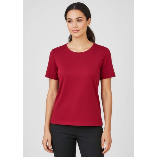 A red short sleeve jersey top for women, featuring a classic round neckline and a logo.