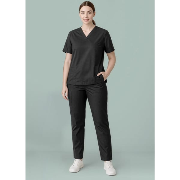 Black women's scrub pants featured with a matching scrub top in a plain background. The outfit has a simple logo.