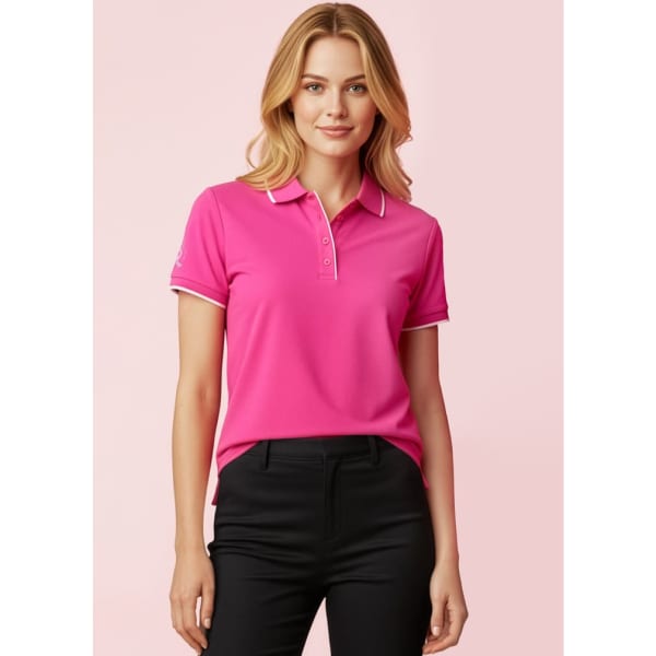 A women's pink short sleeve polo shirt with contrasting trim and a logo on the sleeve.