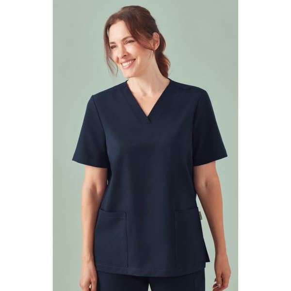 A navy women's v-neck scrub top with short sleeves and two front pockets, featuring a logo.
