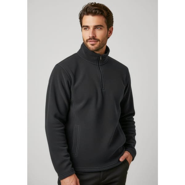 A black polar fleece jumper with a zip collar and side pockets, worn by a man. It features branding.