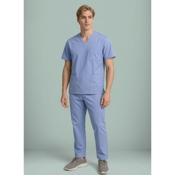 A model wearing light blue unisex scrub cargo pants and a matching short-sleeve top, both featuring pockets.