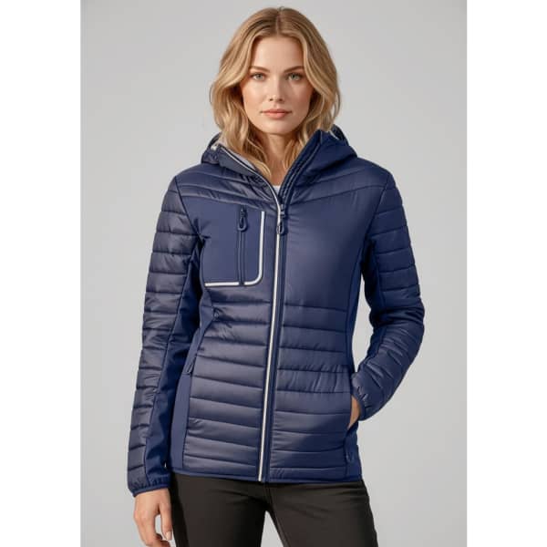 A unisex patrol jacket in navy with a zip front, hood, and decorative pocket. It features a logo on the chest.