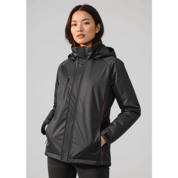 A unisex black jacket with red accents and a hood, featuring pockets and a zip closure. It has a logo.