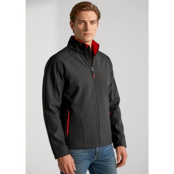 A man in a black soft shell jacket with red accents, featuring a zip front and side pockets.