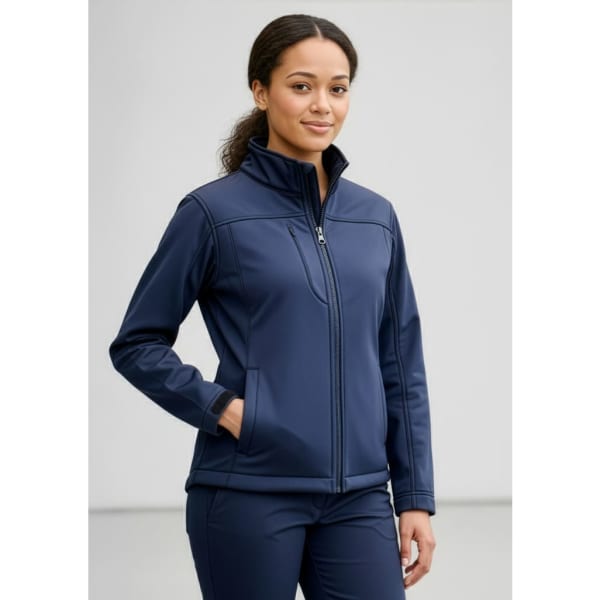 A women's navy softshell jacket with a zip front and two side pockets, featuring a logo on the chest.