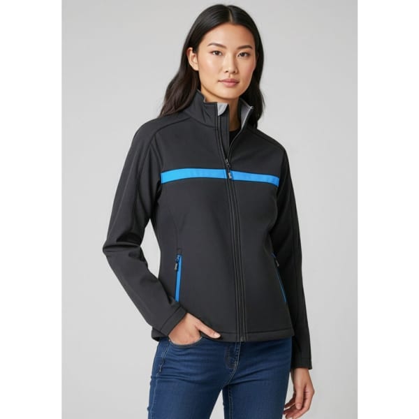 A woman wearing a black soft shell jacket with blue accents and a zipper, featuring side pockets and a collar.
