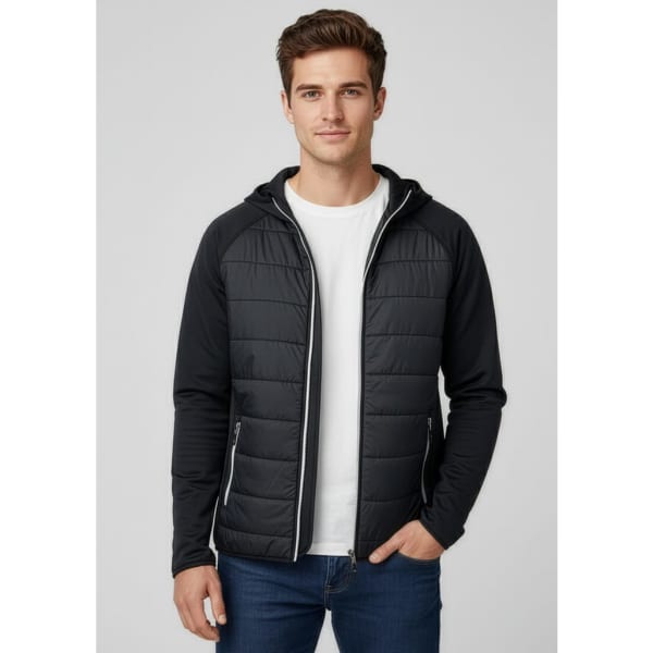 A black soft shell jacket with a hood, featuring quilted front panels and side pockets, worn by a young man.