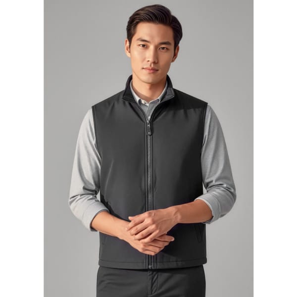 A unisex reversible fleece vest in charcoal, featuring a front zip and side pockets. It has a branding logo.