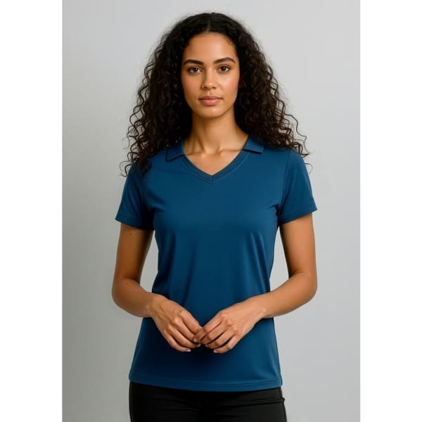 A women's polo shirt in deep blue, featuring short sleeves and a v-neck collar. It has a logo on the front.