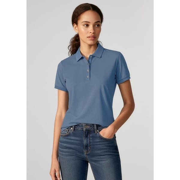 A short-sleeved women's polo shirt in blue, featuring a collar and buttons, worn with jeans.
