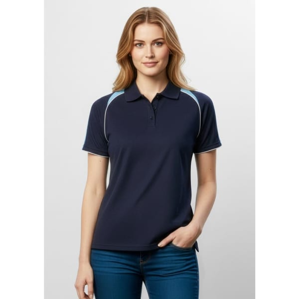 A navy blue women's polo shirt with light blue accents and a logo. Suitable for casual wear.
