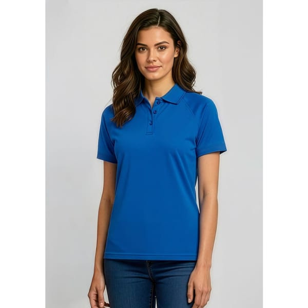 A woman wearing a royal blue short sleeve polo shirt with a collar and a logo on the chest.