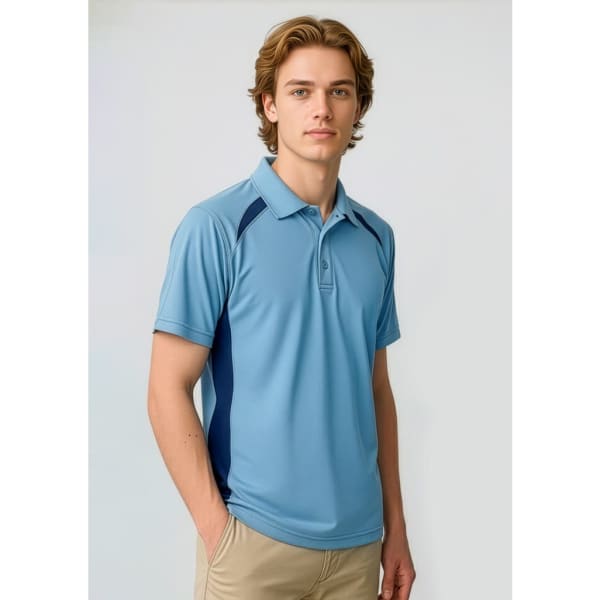 A light blue short sleeve polo shirt with navy side panels and a logo on the chest.