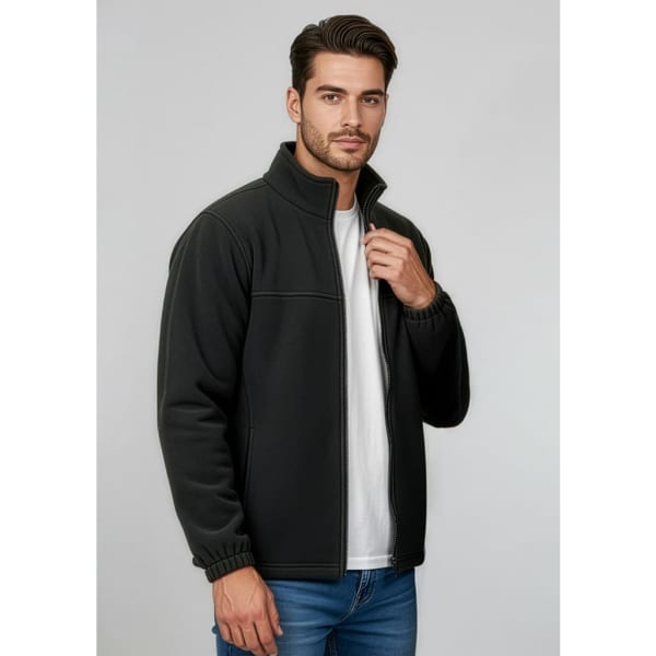 A black micro fleece jacket featuring a zippered front and high collar, worn by a man over a white t-shirt.