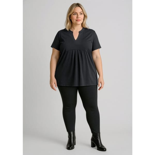 A model stands in black high-rise pull-on leggings paired with a black top. The leggings feature a logo.