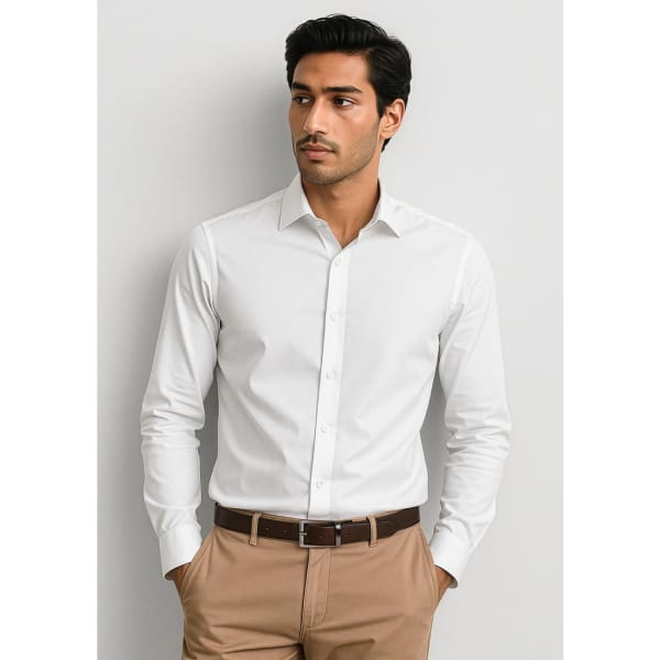 A white slim fit long sleeve button-up shirt worn by a model, paired with beige trousers. It features a logo.