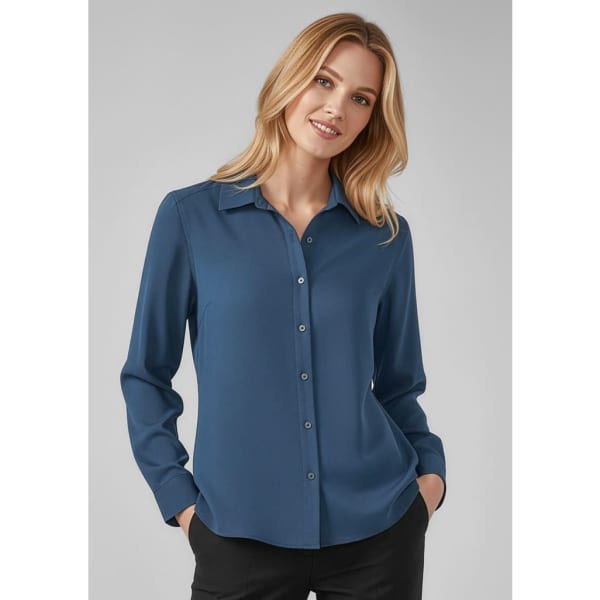 A women's long sleeve button-up shirt in a deep blue shade, featuring a collar and button closure.