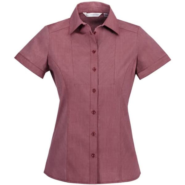 A short sleeve button-up shirt in a rich burgundy hue, featuring a fitted design and a logo.