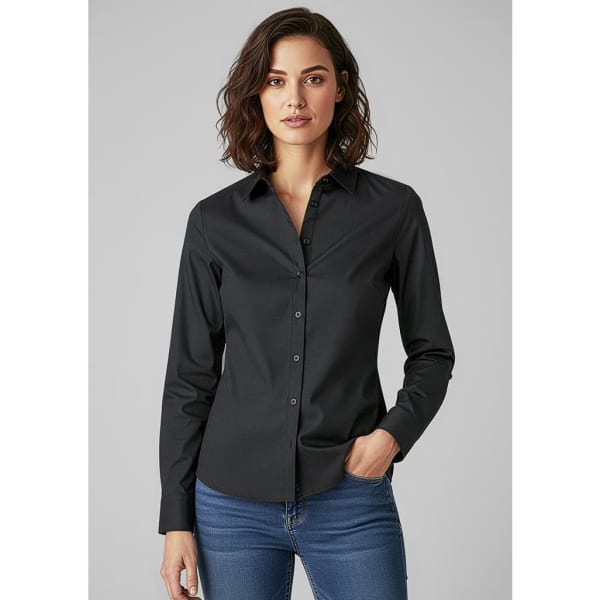 A black women's long sleeve button-up shirt with a fitted design, paired with blue jeans. The shirt has a logo.